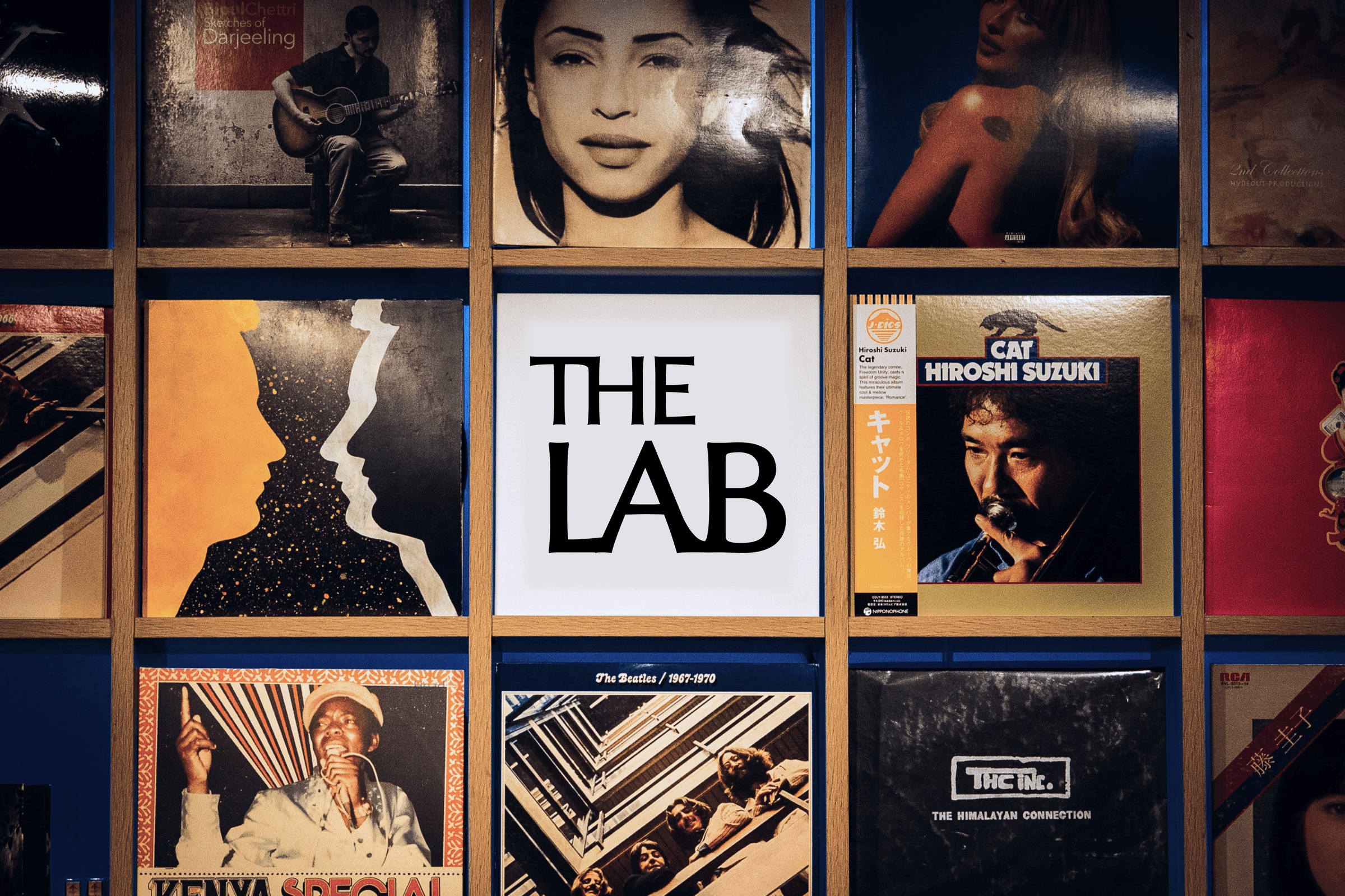 The Lab logo among a wall of record sleeves
